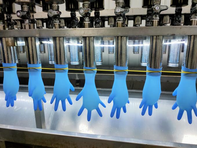 Sarung tangan sekali pakai bahan nitril khusus rumah sakit biru tiga ukuran 0